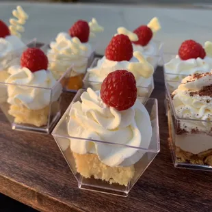 Mini dessert shots: white chocolate raspberry with vanilla rum cake and rumchata cheesecake