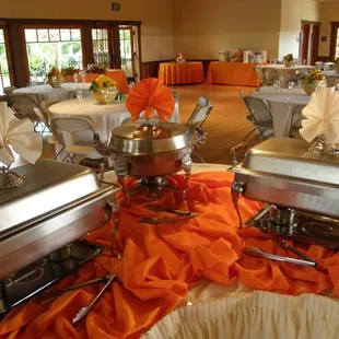 Citrus-themed buffet. Linens come in almost any solid color.  Specialty-finish linens are also available.