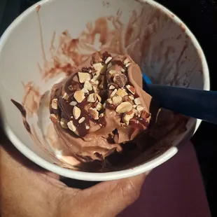 Low fat chocolate yogurt with chocolate fudge and almonds