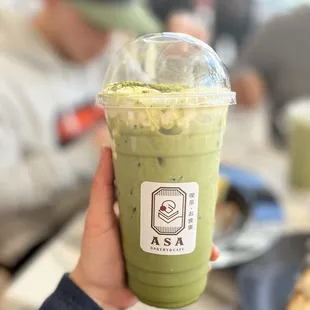 Iced matcha tiramisu latte with oat milk