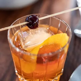 Signature Old Fashioned ($15) Buffalo Trace Bourbon, house gum syrup, Angostura
 bitters
