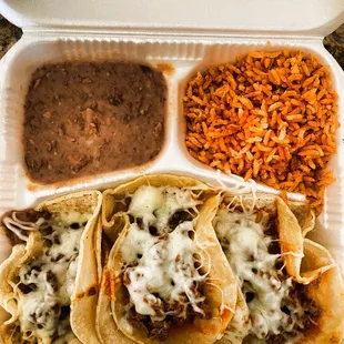 3 taco plate; asada with only cheese and hot salsa with retried beans and rice.