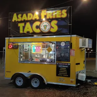 a taco stand at night