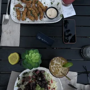 Fried Calamari with chipotle sauce, Asada Steak salad and Strawberry margarita and Mango margarita!