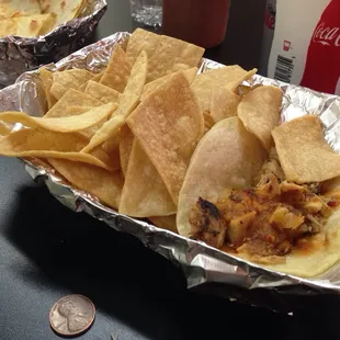 Chips and a scrawny taco for $4.99