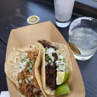 Brisket taco, cauliflower taco, margarita and Paloma. The brisket taco is great! The margarita was pretty good too.