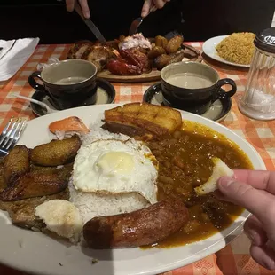 Their Bandeja Paisa ! Plus the 1/2 chicken in the background. Super yum!