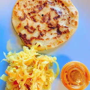 Pork and cheese pupusa.