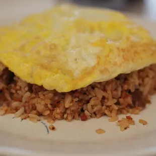 Small portion pork adobo fried rice topped with scramble egg *5/18/24