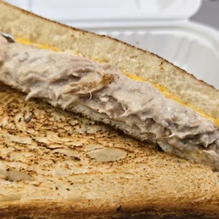 Tuna melt with extra cheese.