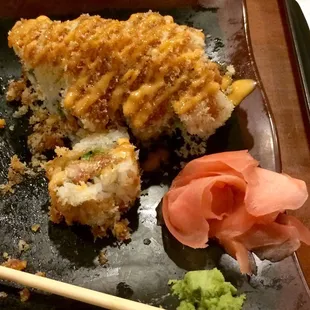 I think this sushi chef feels that if he adds enough thousand Island dressing and bacon bits, he'll create spicy tuna!?