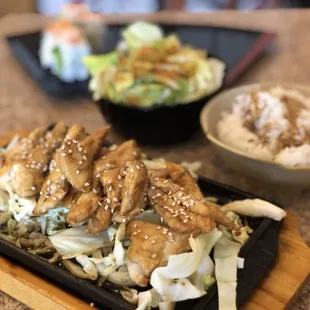 Sizzling teriyaki chicken with rolls on the side. Soup/salad included. No filters