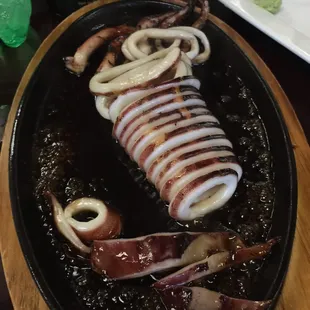 Seared squid! Comes out sizzling! The sauce it lays on is delicious!