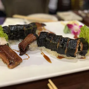 a close up of a plate of sushi