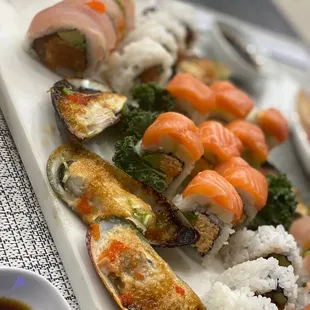 Baked muscles, salmon and albacore roll.