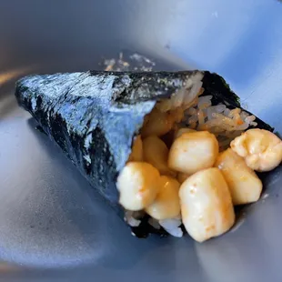 Scallop hand roll. It was a little cooked