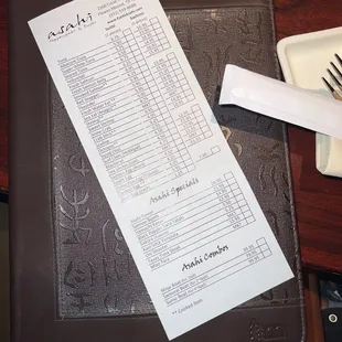 a receipt and a fork