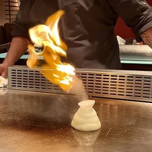 a chef making a sushi
