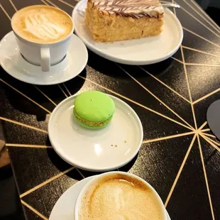 Oat milk cappuccino, pistachio rose macaron, cappuccino and napoleon dessert