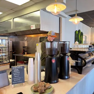 a man working at a coffee shop