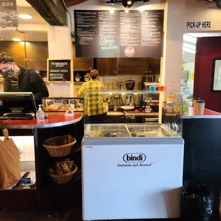 a man working behind the counter