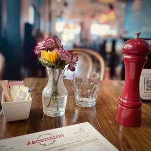 a vase of flowers on a table