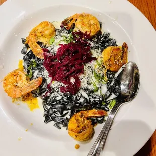 Squid ink pasta with prawns