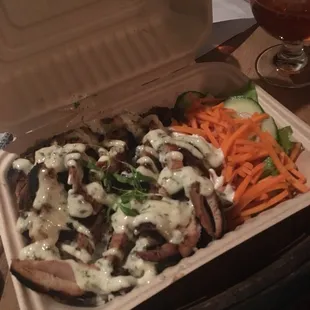 Filipino BBQ chicken with herb aioli over rice