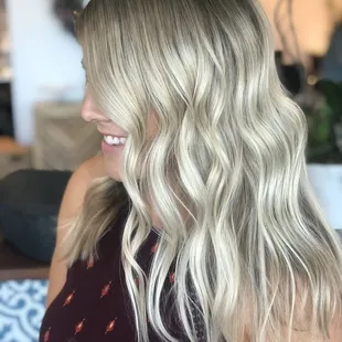 Light blonde with a natural blended root.
