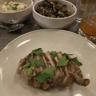 Duroc pork chop with sour cream mashed potatoes &amp; fried brussels sprouts