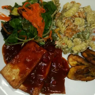 Organic Breaded Tofu Smothered in Ashanti's Calypso BBQ Sauce, Vegan Rasta Pasta, Organic Marinated  Salad, and Plantain