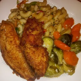 Fried Tilapia with Rasta Pasta and Vegetable Medley of carrots and brussel sprouts