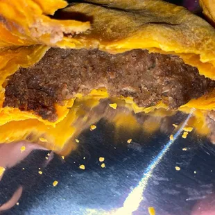 a close up of the inside of a hamburger