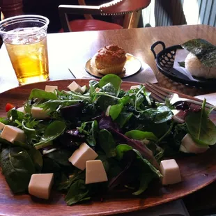 Tofu salad, spicy salmon rice ball, vegan blueberry muffin, iced tea
