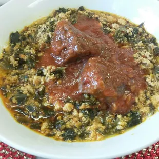 Grace H. has the receipt so I don&apos;t know what this is but it was pretty excellent and went well with fufu. Flavorful + declicious. Get some.