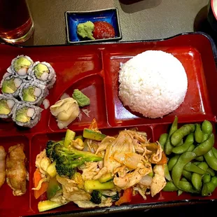 Bento box chicken curry with cali roll yum