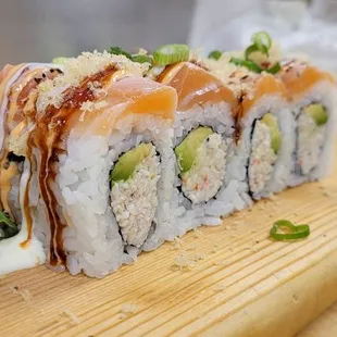 a sushi roll on a cutting board