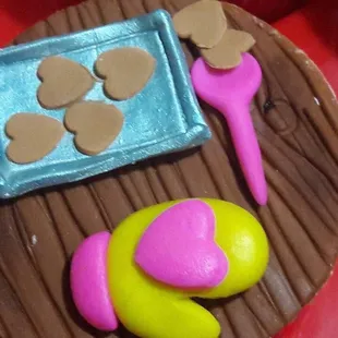 a chocolate cake with pink icing