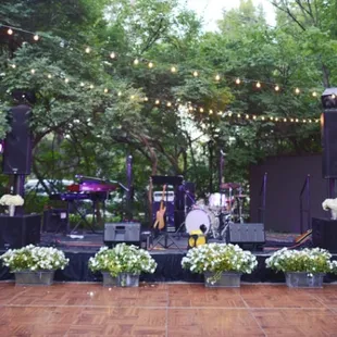 band stage setup (flowers and cafe lights not included)