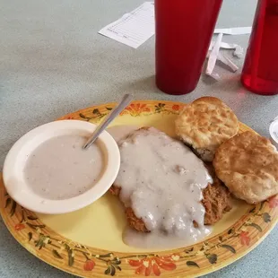 Country fried steak and biscuit and gravy