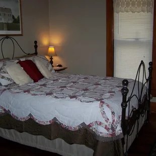 Heritage Room, upstairs, queen bed, private en-suite bathroom with claw foot tub and shower riser