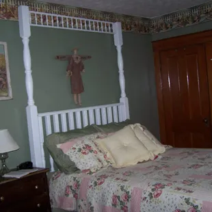 Garden Room, upstairs, queen bed, private en-suite bathroom with claw foot tub and shower riser