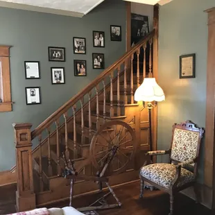 Stairs to second floor. The portraits are of all the owners back to when it was built in 1897