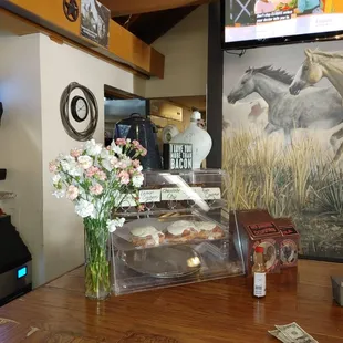 a table with a vase of flowers