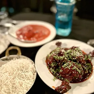 Chicken lollipops, butter chicken, and rice