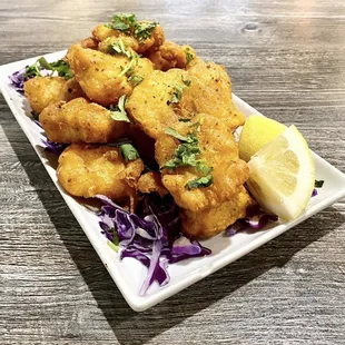 Delicately spiced fried fish coated in a garbanzo bean batter lightly fried to golden crisps!