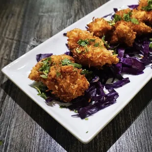 Coconut Shrimp - Crispy shrimp rolled in a coconut batter, lightly fried