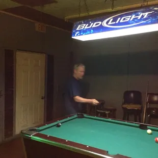 a man playing pool