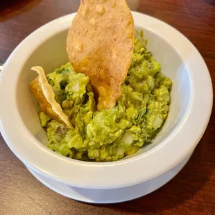 a tortilla and guacamole
