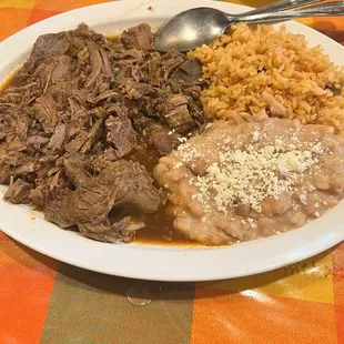 Goat Birria  rice and beans
